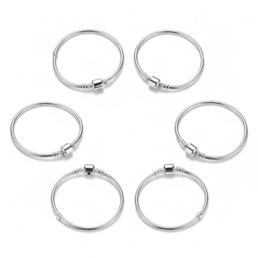 Set of six 925 Silver Snake Bone Bracelets showcasing their sleek design and luxurious polish.