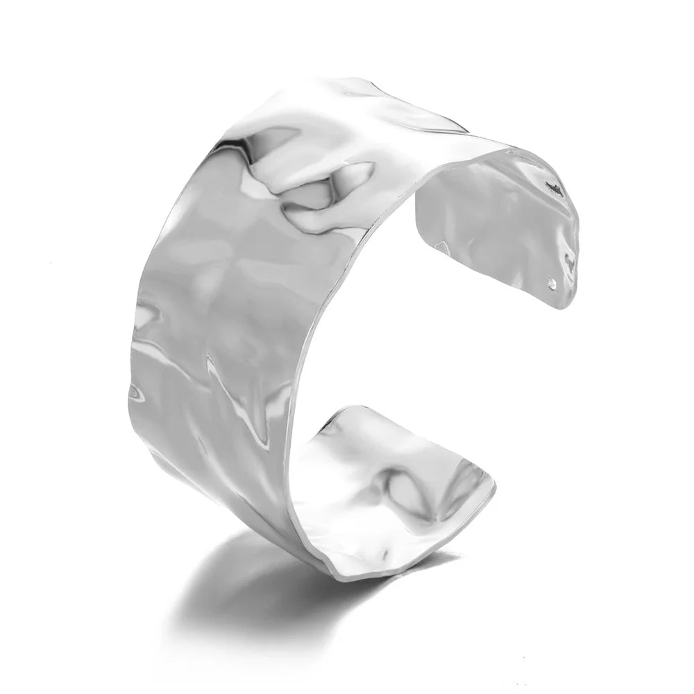 Silver cuff bracelet on a white background