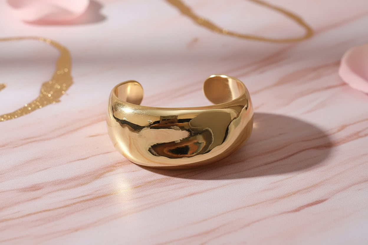 "Woman wearing sculpted infinity twist bracelet on wrist"