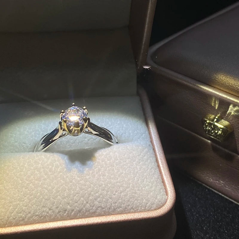 Moissanite Vow 18K Gold Plated Gemstone Ring displayed in a luxurious jewelry box, showcasing its brilliance and classic design.